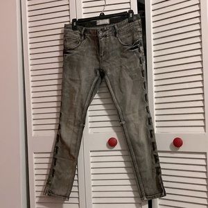 Free People Mid rise skinny grey jeans w/ black lacing on sides size 26